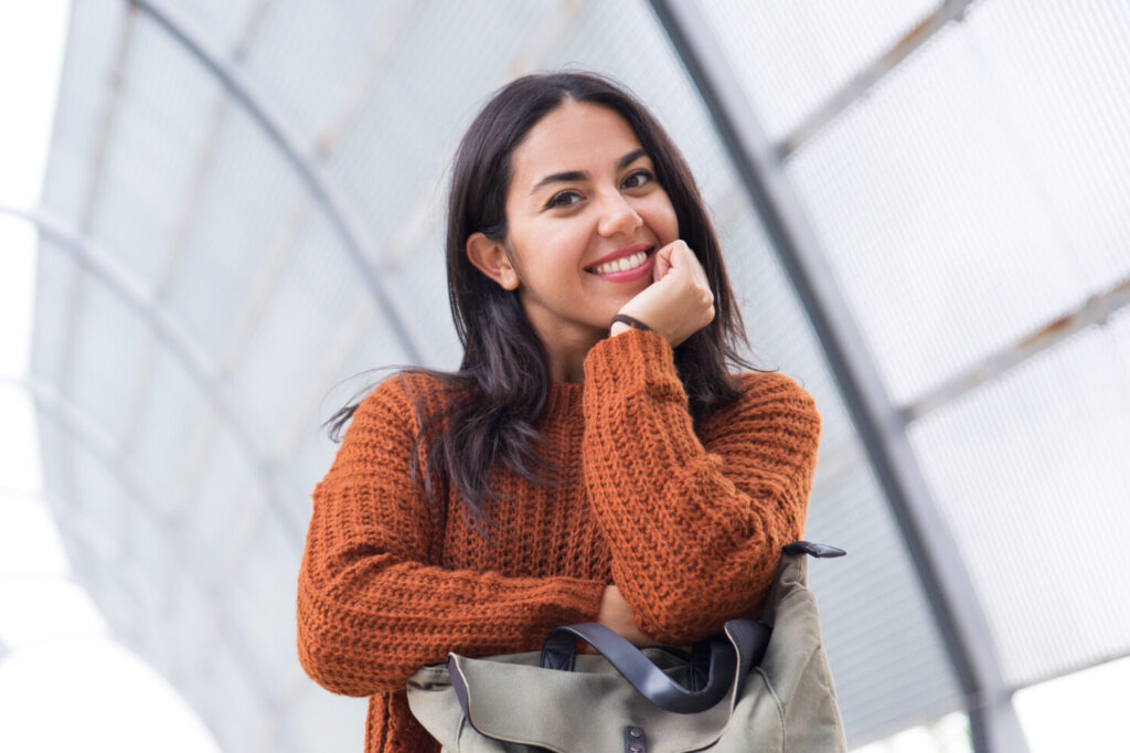jolly-young-woman-leaning-handbag-city-park-scaled-e1737408146884-1024x682 Corporacion Educativa Del Prado